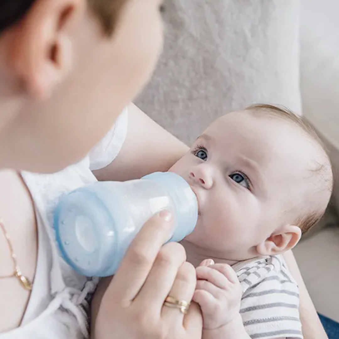 Baby with bottle formula