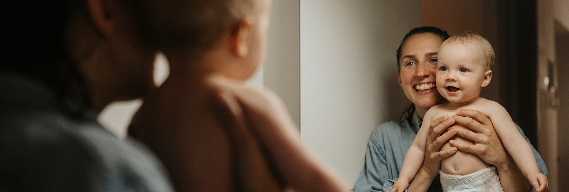 Mother and baby in morror