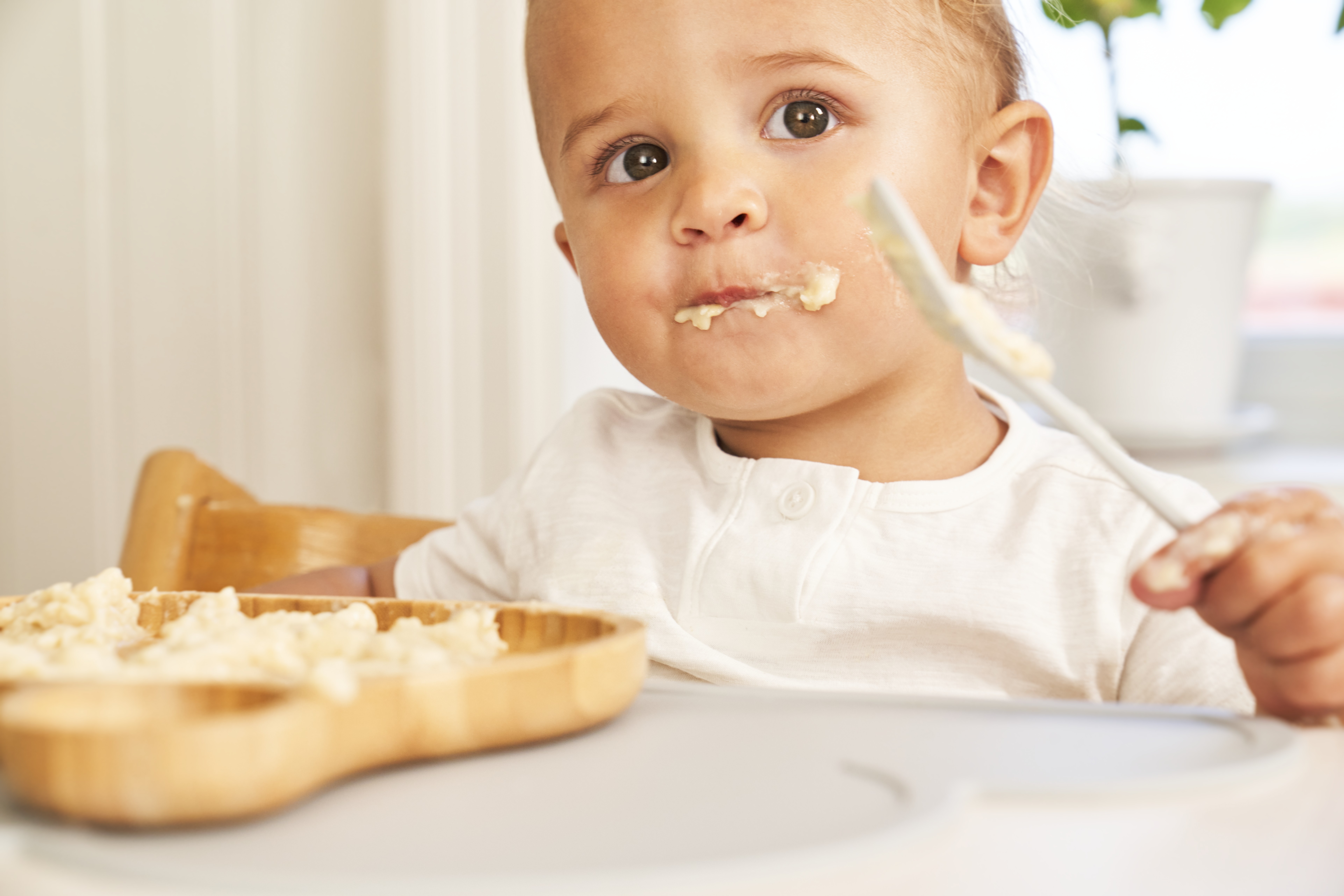 Kid with porridge